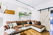 stylish modern living room with comfortable couch 2026 03 25 08 37 18 utc Porte scorrevoli a scomparsa in ristrutturazione: gli errori da evitare