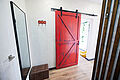 interior with red barn door and wood accents 2026 03 17 02 13 49 utc